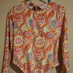 Colorful cheeky one piece with sleeves